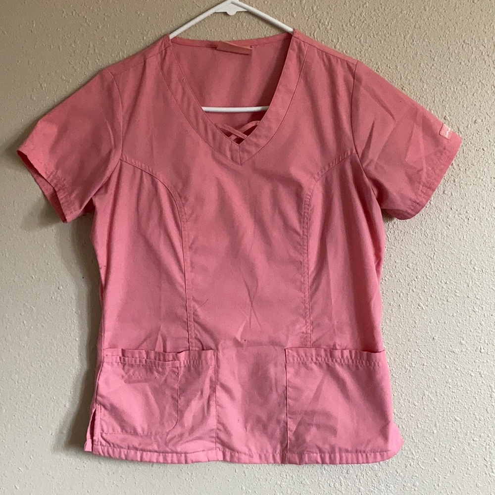 Women’s XS butter-soft scrub top by Uniform Advantage in light pink